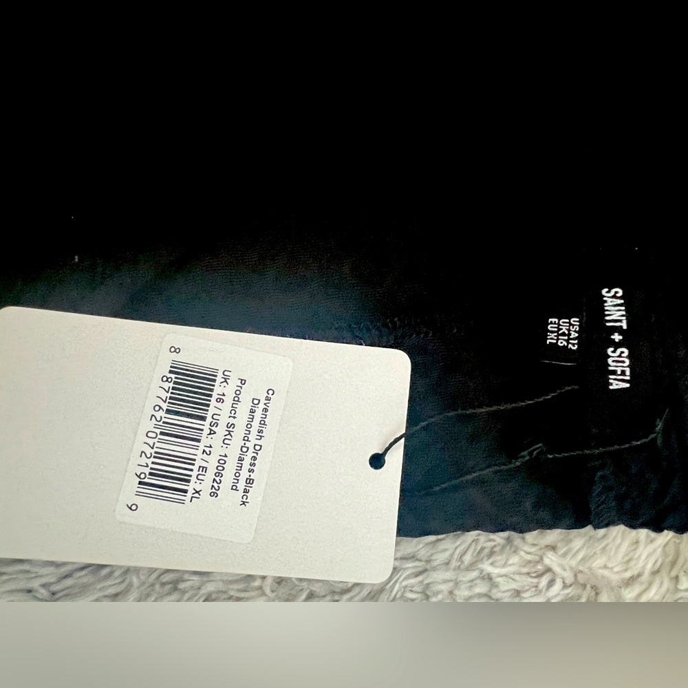 Womens Cute Black Dress with puffy sleeves. Never worn. With tags.